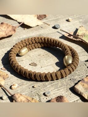 Plunder Braided Leather Spring Bracelet with Gold Cap Tips